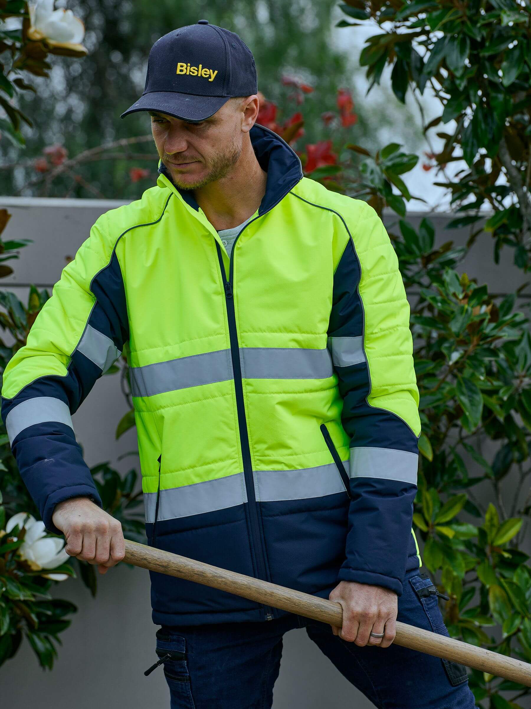 Mens Hi Vis Puffer Jacket with quilted insulation and custom corporate logo embroidery